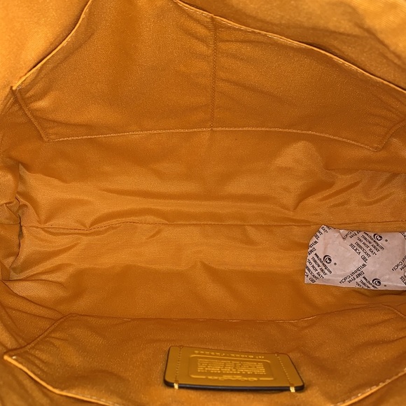 Coach - Picture 11 of 12